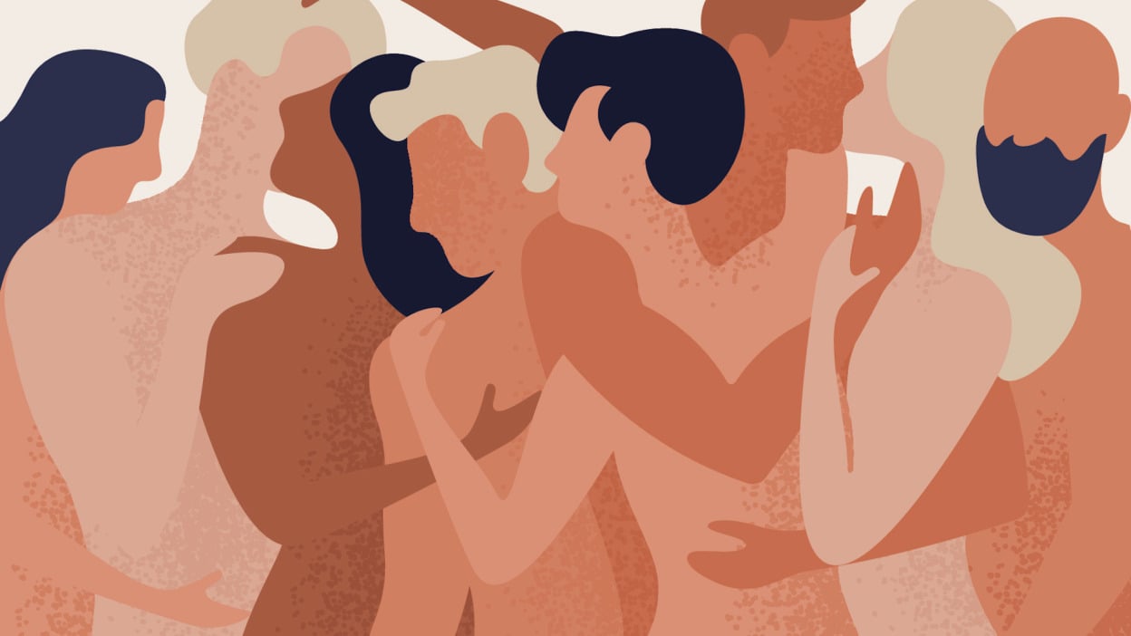 Crowd of naked men and women hugging and kissing.