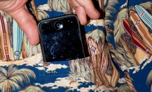 An image of a smartphone with a scratched screen.
