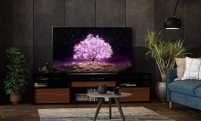 LG C1 OLED 4K TV in living room with potted plants