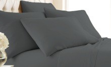 Six-Piece Bamboo-Blend Luxury Sheet Set on a bed.