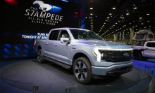 Ford F-150 Lightning on stage at vehicle show