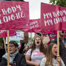 Pro-choice supporters stage a demonstration in Parliament Square to campaign for women's reproductive rights, legalisation of abortion in Northern Ireland and its decriminalisation in the UK on 11 May, 2019 in London, England.