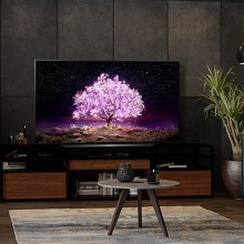 LG C1 OLED 4K TV in living room with potted plants