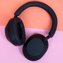 headphones on split color background 