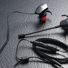 earbuds against a gray background