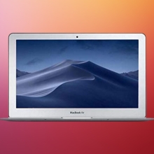 MacBook Air on red background