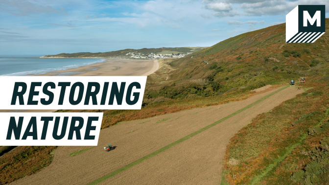 A tractor sows over plain land near the coast in Devon. Caption reads: restoring nature