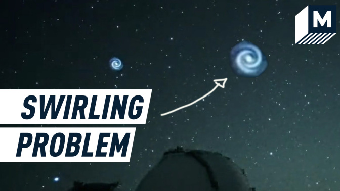Picture of the swirling spiral in the night sky passing over the Subaru Telescope. Caption reads: "Swirling problem"