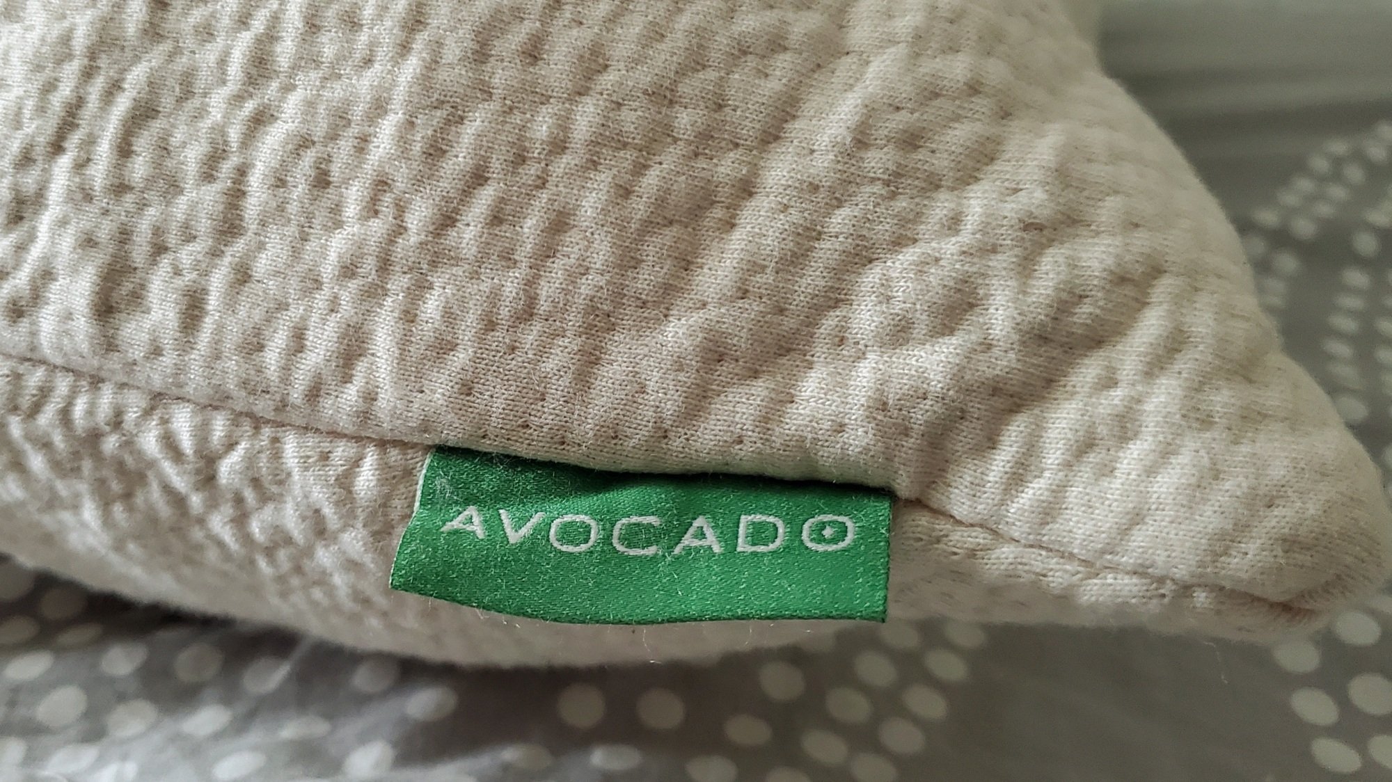 "avocado" tag on side of pillow