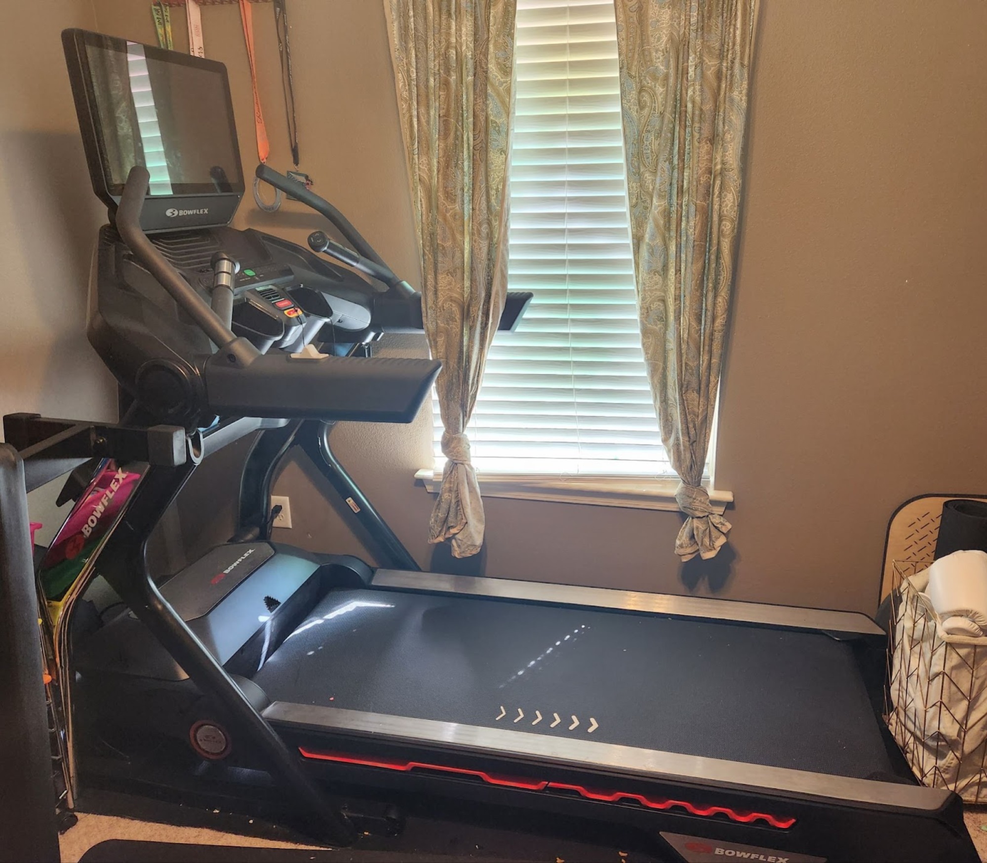 large treadmill in corner of a room