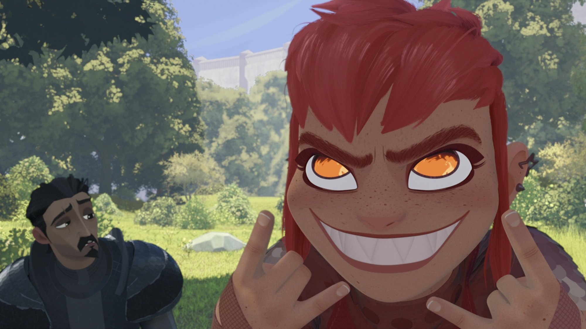 A knight in black armor sits on a grassy lawn while a young girl with pink hair makes punk signs with her hands and grins with fanged teeth and fiery eyes.