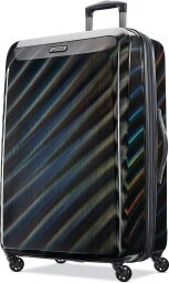 American Tourister black hardside spinner suitcase with iridescent stripes