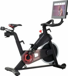 Pro-Form indoor cycling bike with exercise instructor on screen