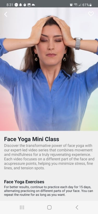 app screenshot of woman doing face yoga, grabbing her head with two hands