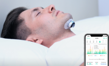 man laying down with snore circle device and app