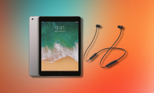 refurbished ipad and beats headphones on an orange and teal gradient background