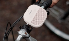 beige bose speaker on bike handle