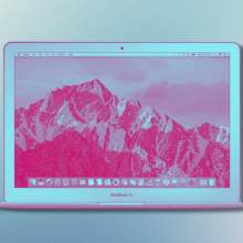 refurbished macbook air with blue and pink tint and blue background