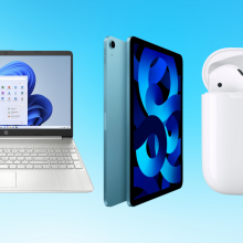 Laptop, iPad, and AirPods against a blue background 