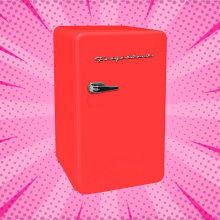 red retro mini fridge against a pink background 
