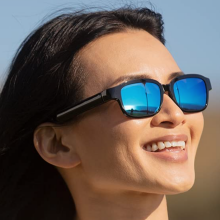 woman wearing Amazon Echo Frames staring toward the right side